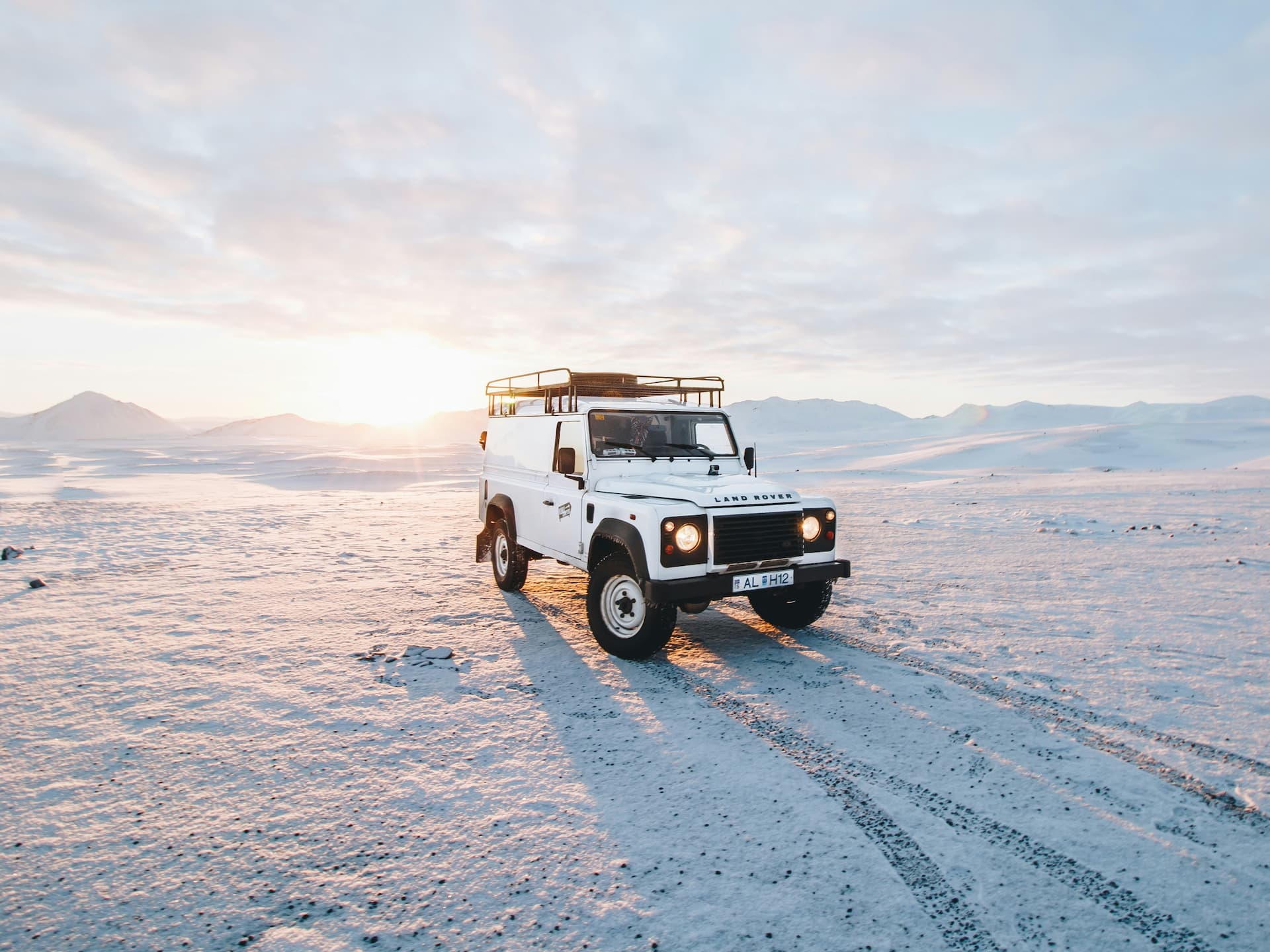 Jeep in Icelandic winter landscape
